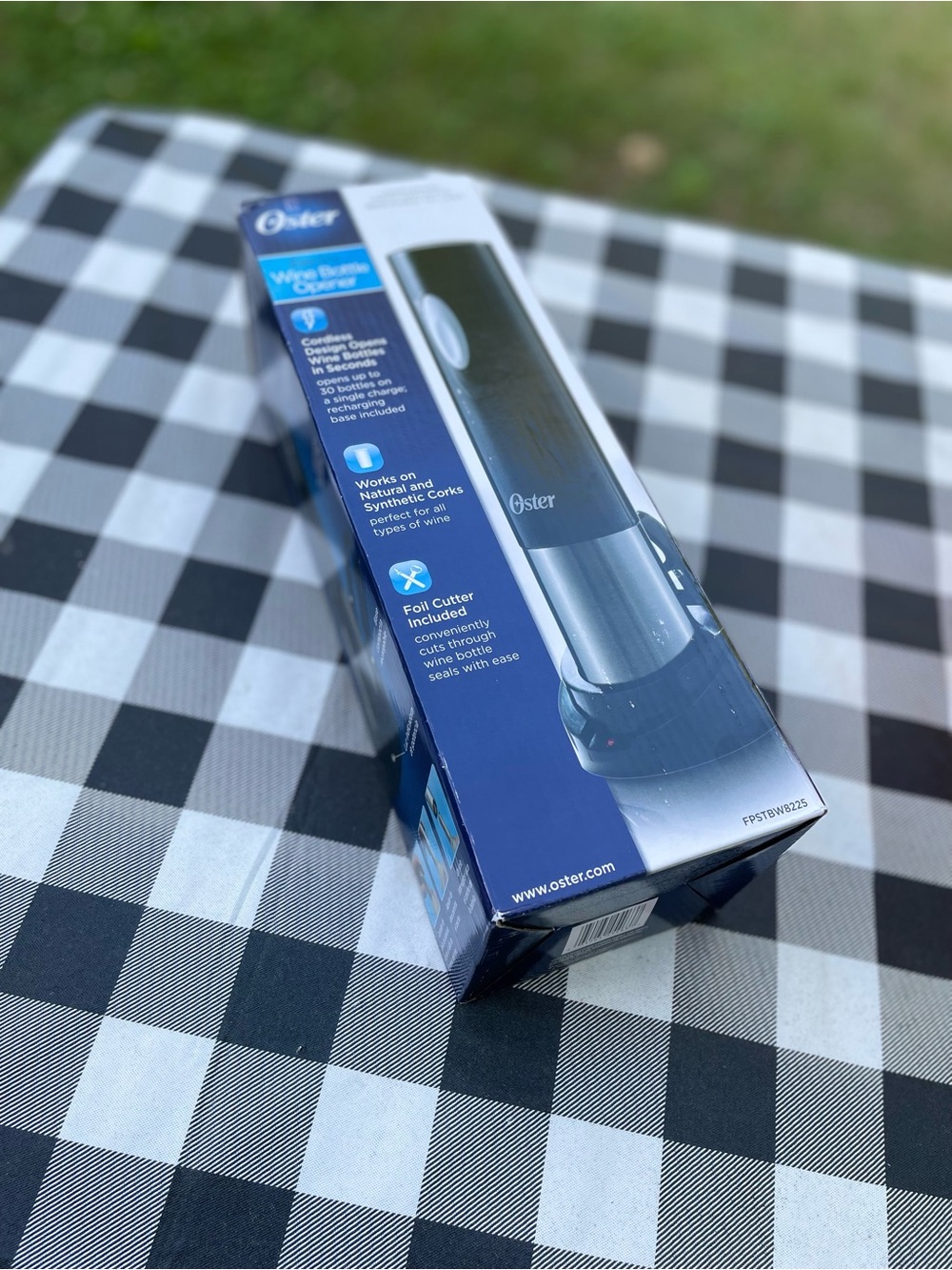 Oster Electric Wine Opener in Black and Blue Packaging
